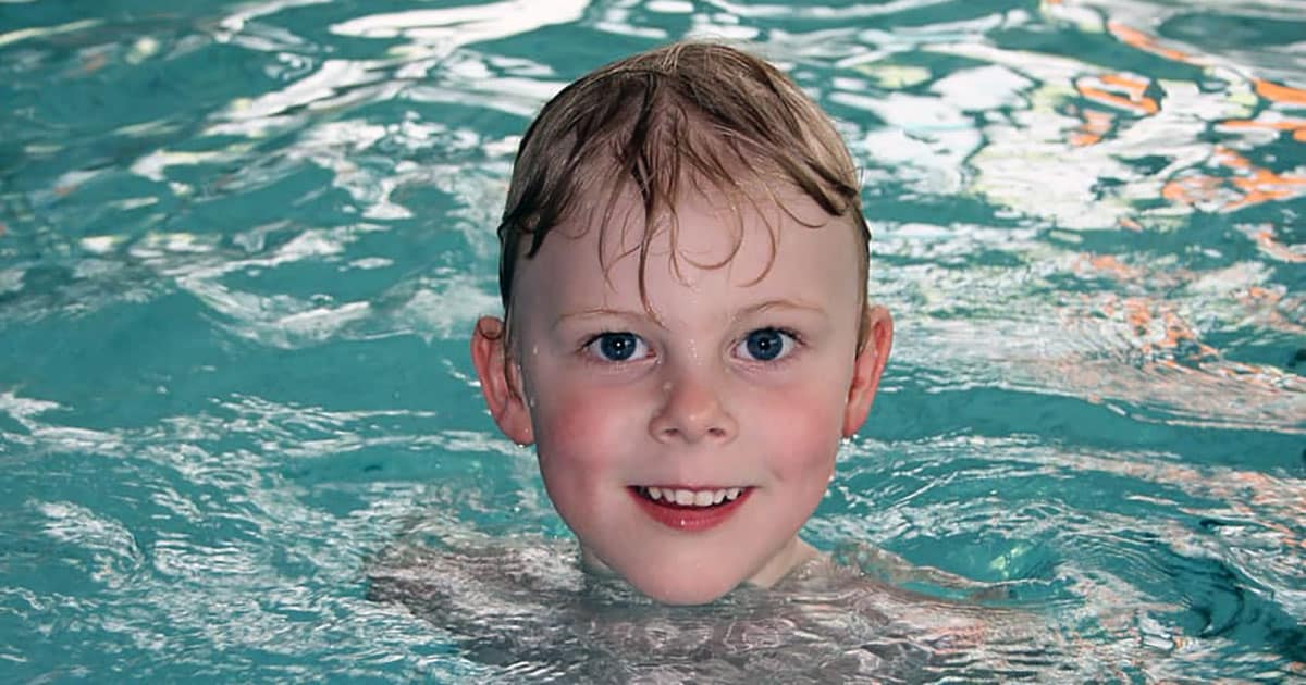 Boy in swimming pool