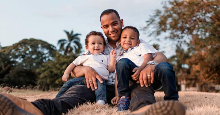 Happy father with children